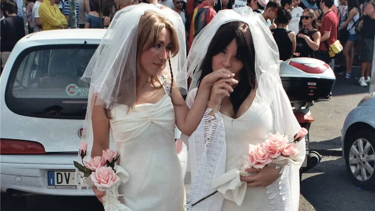 Two young Italian girls, both dressed as bride advocating for same-sex marriage at the 2010 Gay Pride in Rome