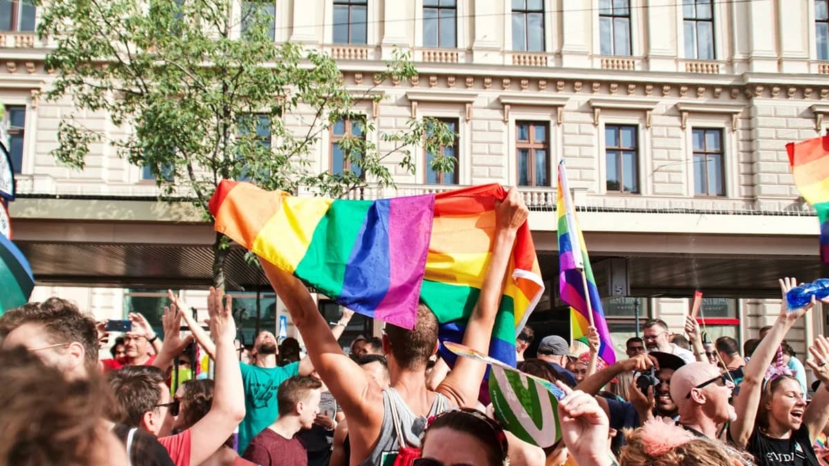 people gathering near building during daytime