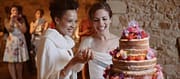 Shoshona and Meredith cutting cake