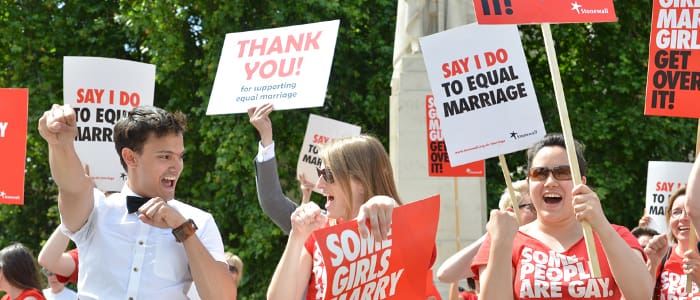 Photo credit: Simon Callaghan - Equal marriage supporters at a Stonewall rally outside the House of Lords as peers gave the Bill Third Reading on 15 July.