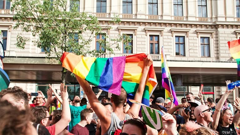 people gathering near building during daytime